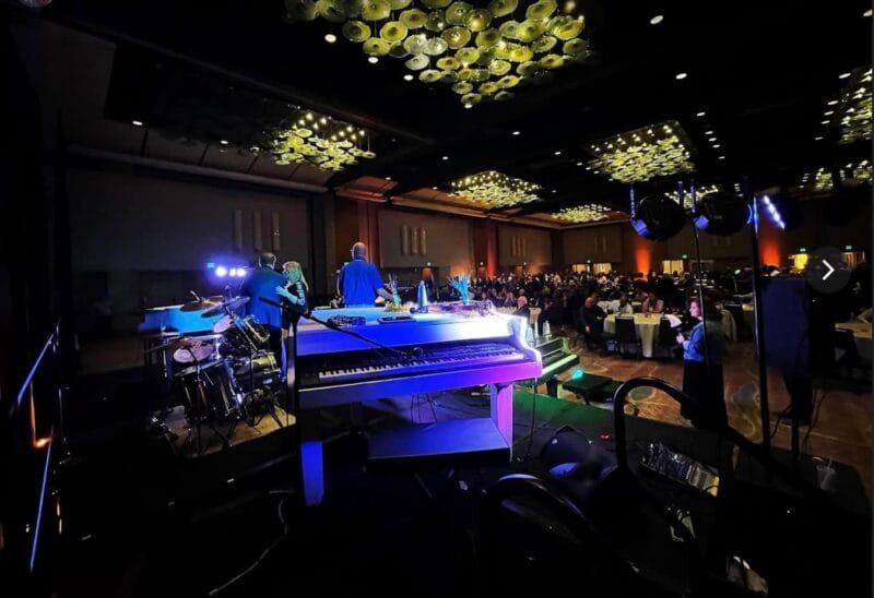 4 Grands 8 Hands – set up for California corporate
