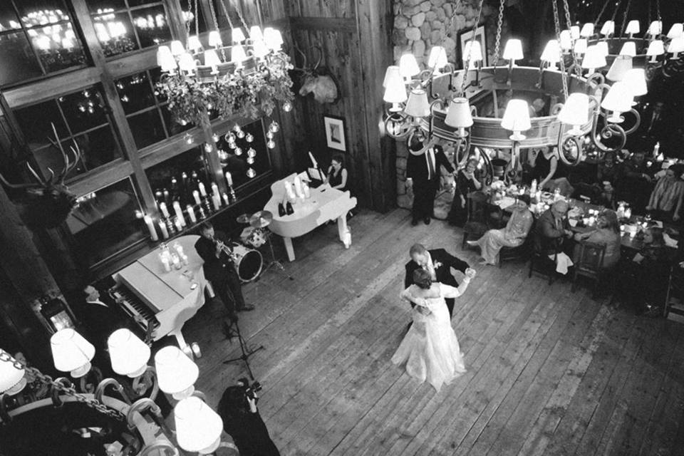 A black and white photo of two people dancing