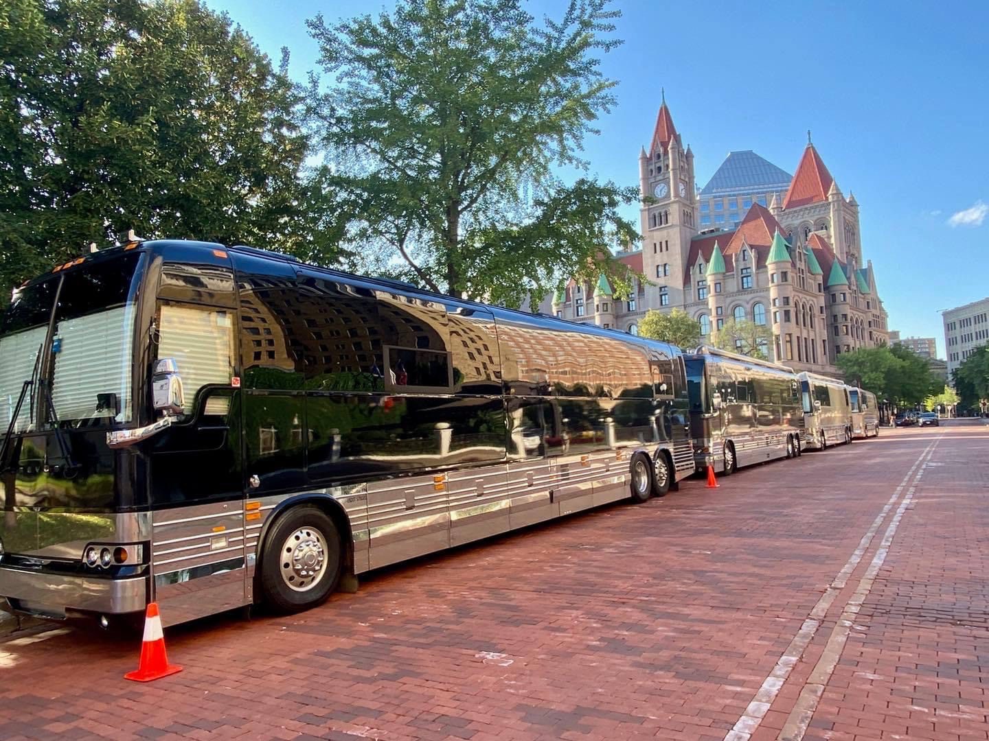 A large bus parked on the side of a road.