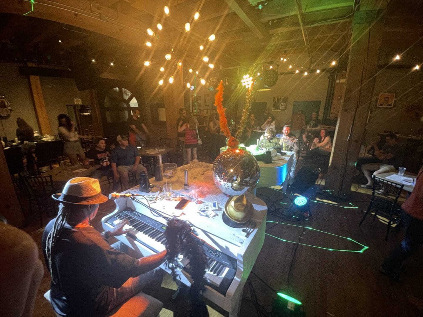 A group of people sitting around a table.