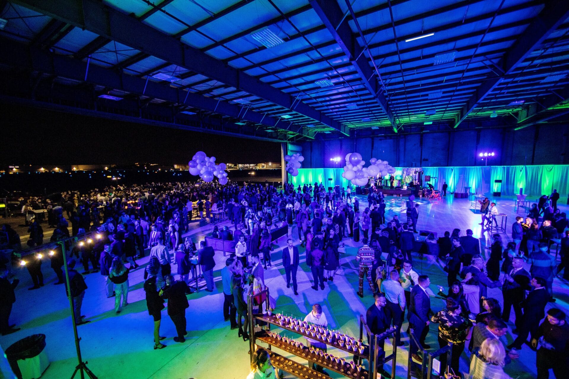 Guests enjoying a private dueling pianos party with live music and dancing